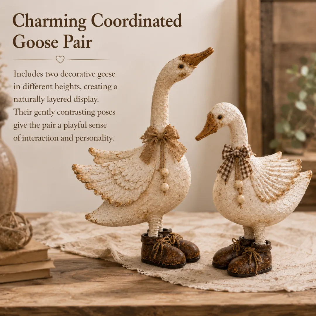 Detailed layered feather texture on cream goose figurines